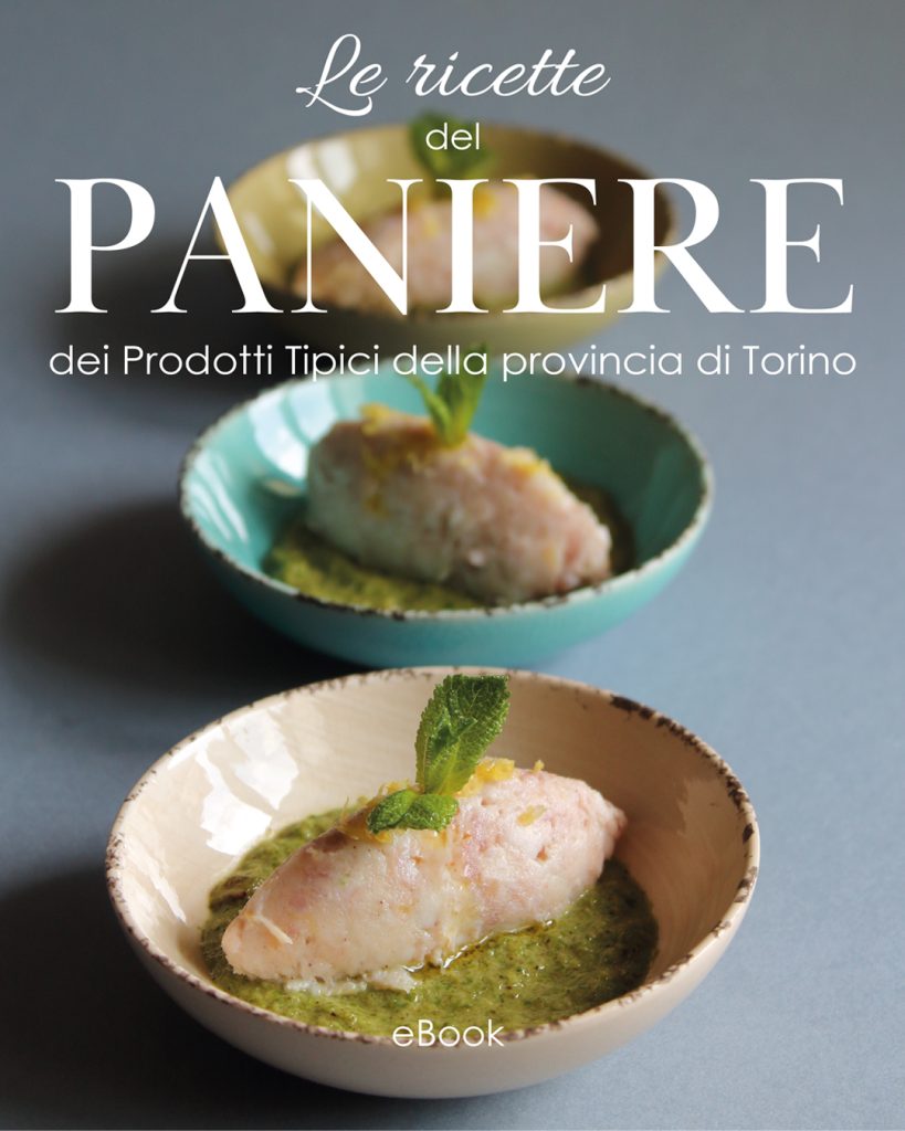 Copertina del ricettario Le Ricette del Paniere dei Prodotti Tipici della Provincia di Torino con finger food su crema verde – foto di Paola Uberti